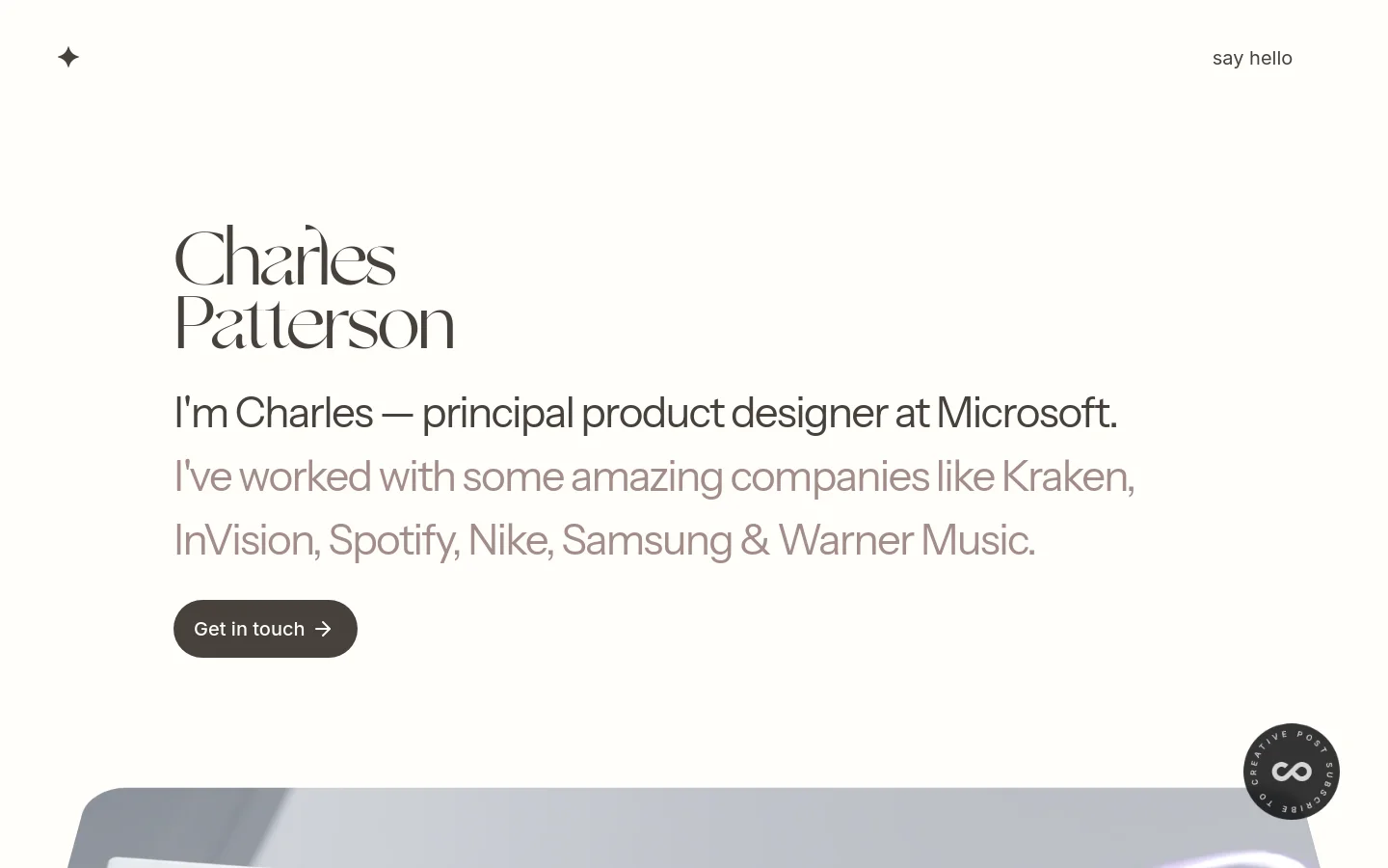 A minimalist portfolio homepage with a clean white background and dark serif typography. The hero section features the name 'Charles Patterson' in large text, followed by a professional bio and a dark 'Get in touch' call-to-action button. A partial view of a digital product interface is visible at the bottom.