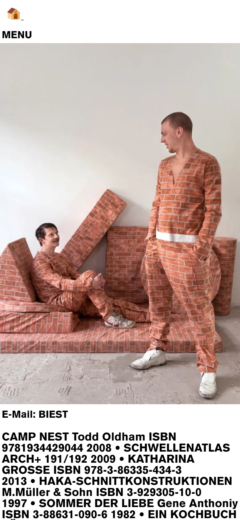 The mobile version presents a single-column layout where the brick-patterned clothing photograph is positioned at the top, followed by the text content below. The header includes a small house icon and a 'MENU' label, with the text content appearing more vertically stacked than the desktop version.
