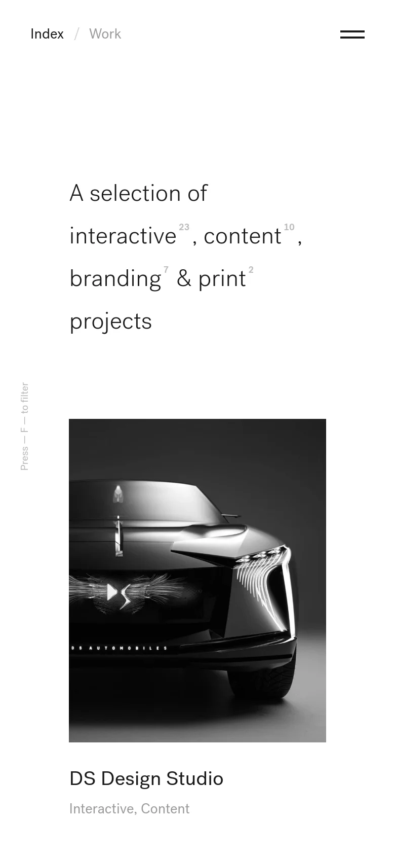 The mobile version maintains the minimalist white aesthetic but reflows the content into a single-column vertical layout. The headline and project imagery are scaled to fit the narrower screen width, ensuring the large car image and text remain the central focus as the user scrolls.
