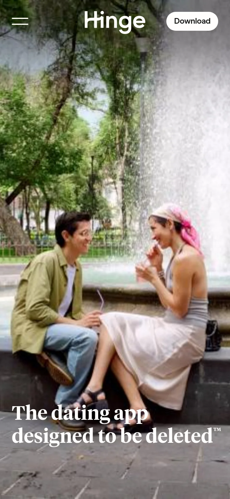 The mobile version displays a vertically cropped version of the hero image showing the couple by the fountain. The Hinge logo is centered at the top, flanked by a hamburger menu icon on the left and a prominent 'Download' button on the right. The main headline is positioned at the bottom of the screen in large white text.