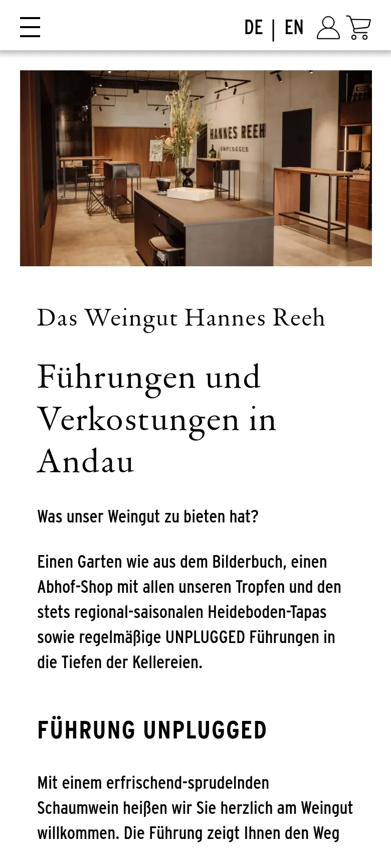 The mobile version presents a vertically stacked layout, starting with a hamburger menu, language toggle, user icon, and shopping cart at the top. The hero image of the winery interior is followed by the main heading and descriptive text about vineyard tours and tastings, with larger text proportions for readability on a smaller screen.