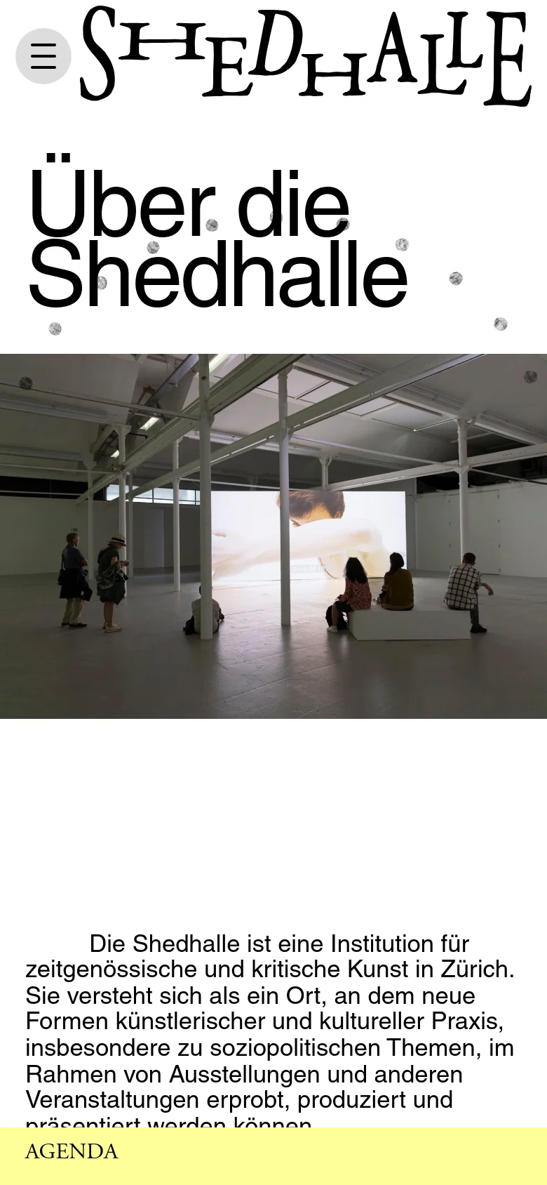 The mobile version uses a simplified vertical layout with a hamburger menu icon at the top left next to the logo. The large 'Über die Shedhalle' headline is followed by a full-width image of the gallery interior and a block of descriptive text. The yellow agenda section is moved to the bottom of the screen.