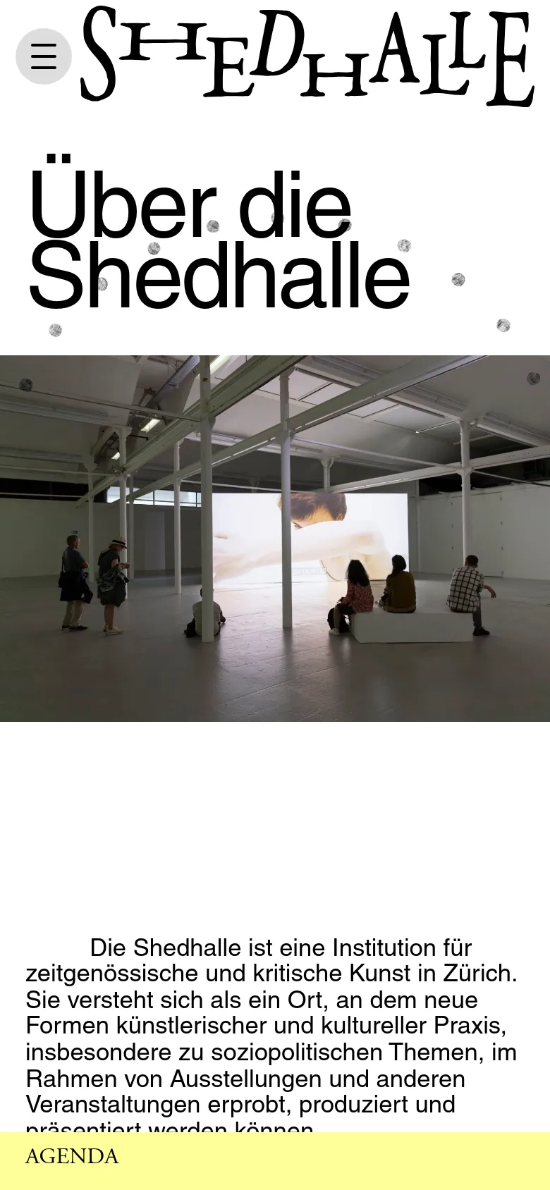 The mobile version uses a simplified vertical layout with a hamburger menu icon at the top left next to the logo. The large 'Über die Shedhalle' headline is followed by a full-width image of the gallery interior and a block of descriptive text. The yellow agenda section is moved to the bottom of the screen.
