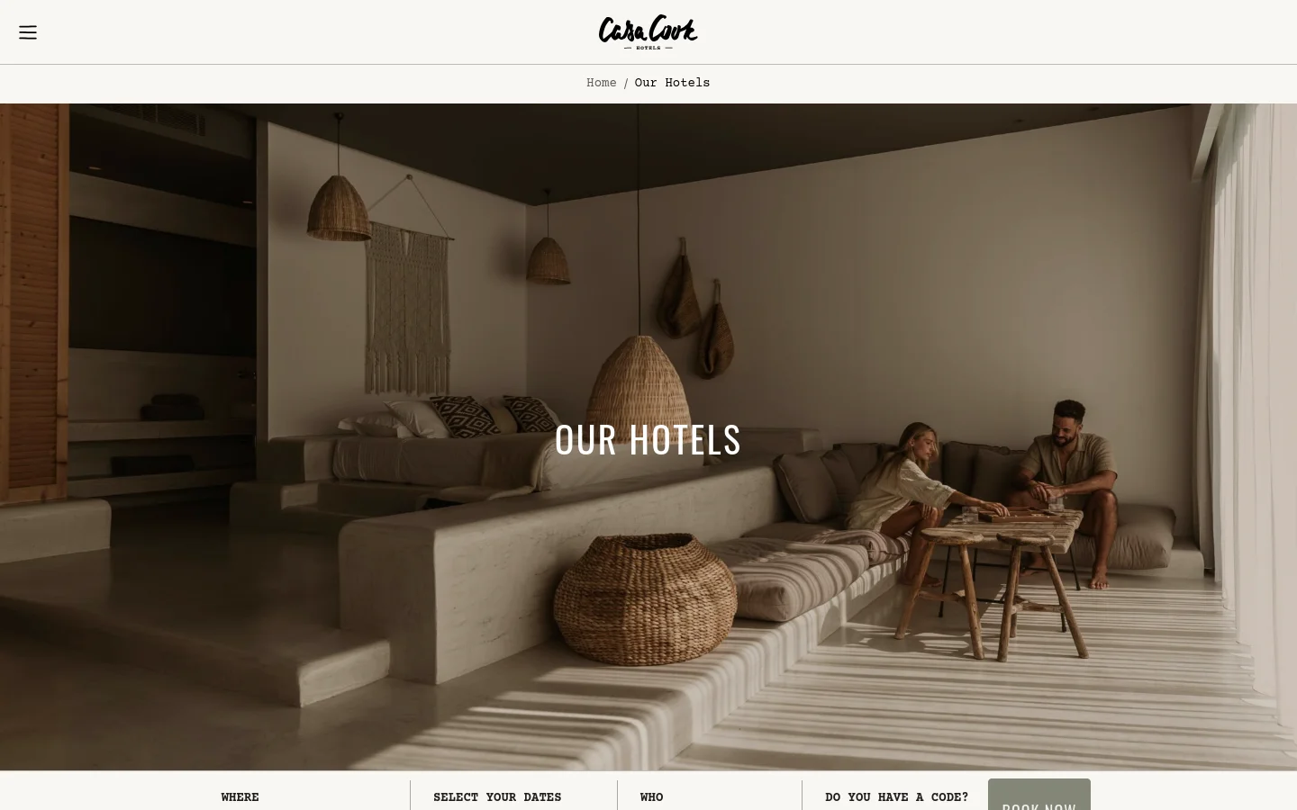 The desktop page features a large hero image of a minimalist, sunlit hotel room with neutral tones and woven decor, overlaid with the headline 'OUR HOTELS'. Below the hero section, a booking bar with fields for location, dates, and guests sits above a grid of hotel listings, each containing a high-quality photograph, title, location, and description.