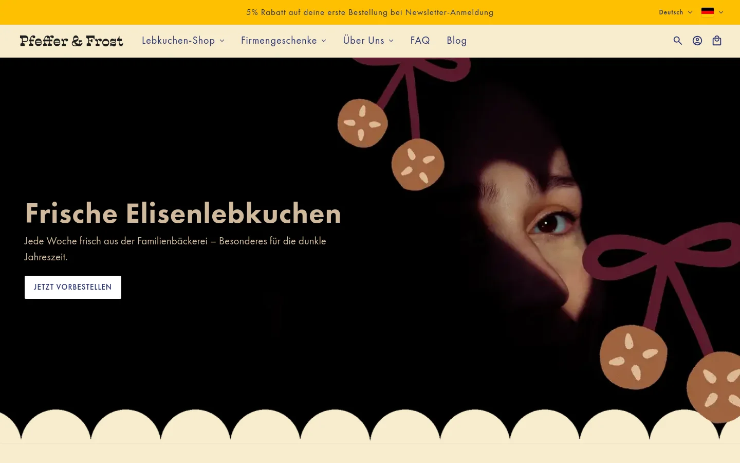 The desktop homepage features a dark hero section with a close-up portrait of a person's eye and stylized gingerbread illustrations. A large headline reads 'Frische Elisenlebkuchen' next to a white 'JETZT VORBESTELLEN' call-to-action button. The navigation menu is at the top with links for the shop, corporate gifts, and more, set against a cream-colored scalloped border at the bottom.