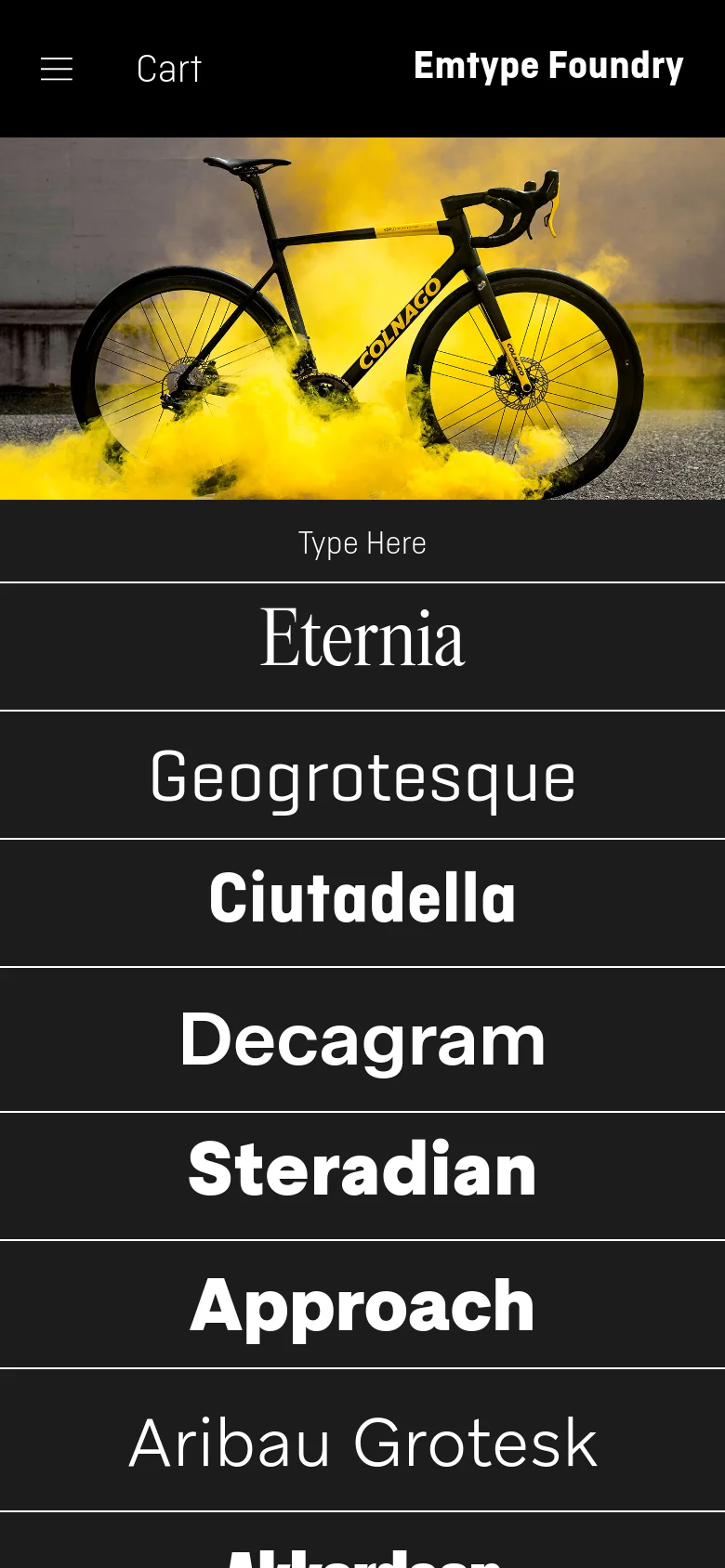 The mobile version shows a simplified black header with a hamburger menu, 'Cart', and the brand name. The hero image features a bicycle surrounded by yellow smoke, followed by a full-width vertical list of typeface names like 'Eternia' and 'Geogrotesque' against a black background.