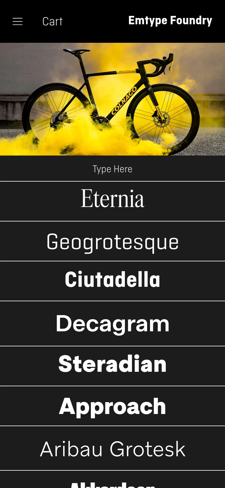 The mobile version shows a simplified black header with a hamburger menu, 'Cart', and the brand name. The hero image features a bicycle surrounded by yellow smoke, followed by a full-width vertical list of typeface names like 'Eternia' and 'Geogrotesque' against a black background.