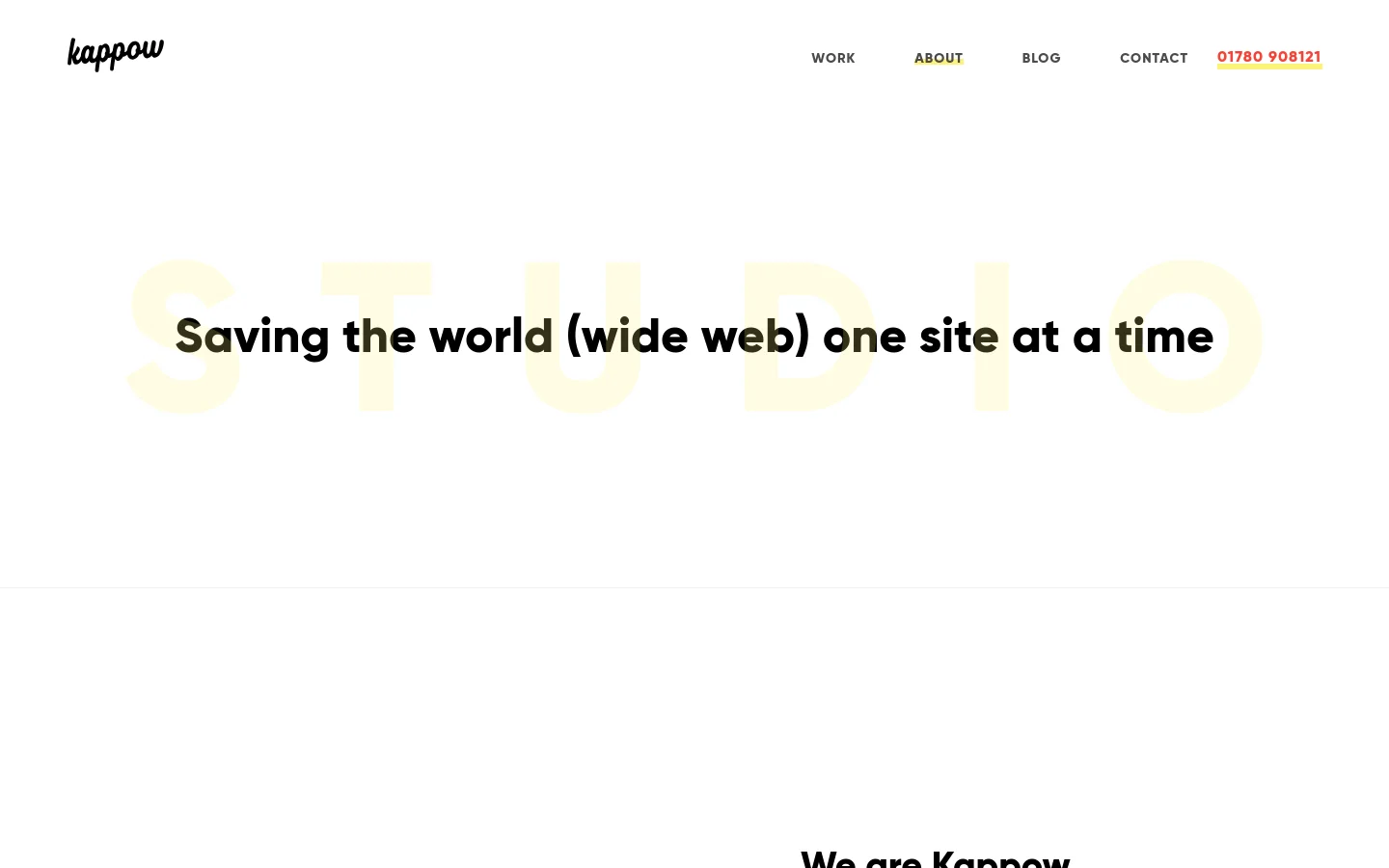 The desktop About page features a minimalist white header with the Kappow logo and navigation links including Work, About, Blog, and Contact. The hero section displays the headline 'Saving the world (wide web) one site at a time' in bold black text overlaid on large, pale yellow decorative typography. Below, a large photograph shows a person working at a desk with multiple monitors in a modern office setting.