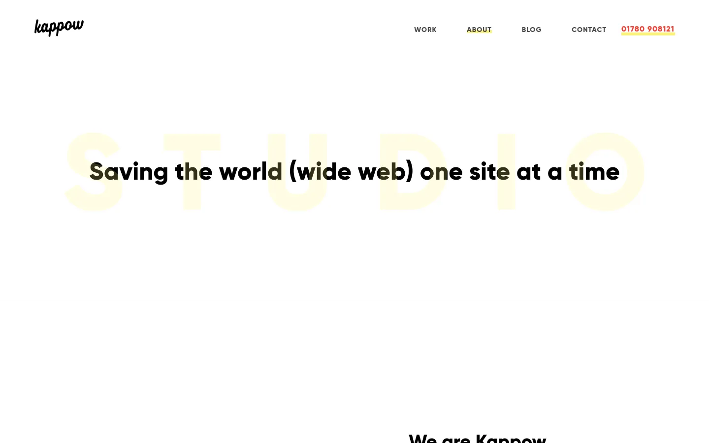 The desktop About page features a minimalist white header with the Kappow logo and navigation links including Work, About, Blog, and Contact. The hero section displays the headline 'Saving the world (wide web) one site at a time' in bold black text overlaid on large, pale yellow decorative typography. Below, a large photograph shows a person working at a desk with multiple monitors in a modern office setting.