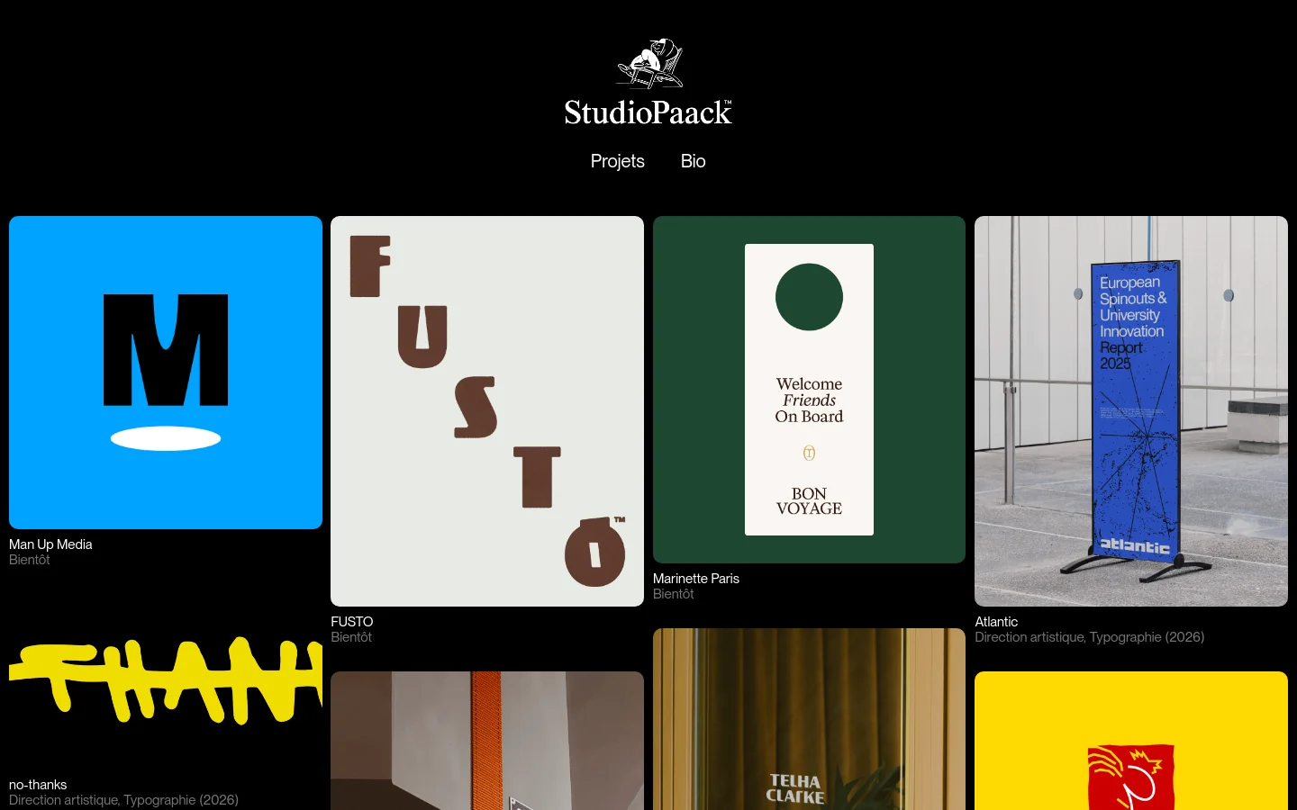 The desktop homepage for StudioPaack features a minimalist black background with a white logo and navigation links for 'Projets' and 'Bio' at the top center. Below, a large grid displays various design projects as high-contrast rectangular tiles with bold typography and colorful imagery. Each project tile includes a title and brief description, such as 'Atlantic' with its artistic direction details.