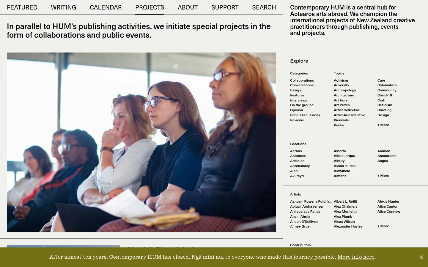 The Projects page features a minimalist white and black layout with a large hero image of people sitting in an audience. A large bold headline reads 'Projects' above a text block explaining the organization's special projects, followed by a multi-column footer containing categorized links for Topics, Locations, and Artists.