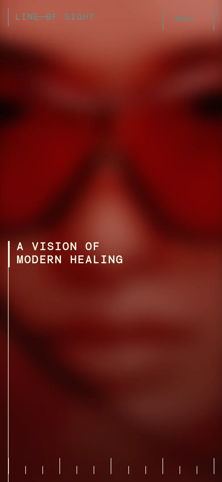 The mobile version simplifies the layout, replacing the side navigation with a 'MENU' button at the top right. The hero image remains a blurred close-up of a person in red glasses, but the headline 'A VISION OF MODERN HEALING' is repositioned to the left side of the screen to accommodate the vertical aspect ratio.