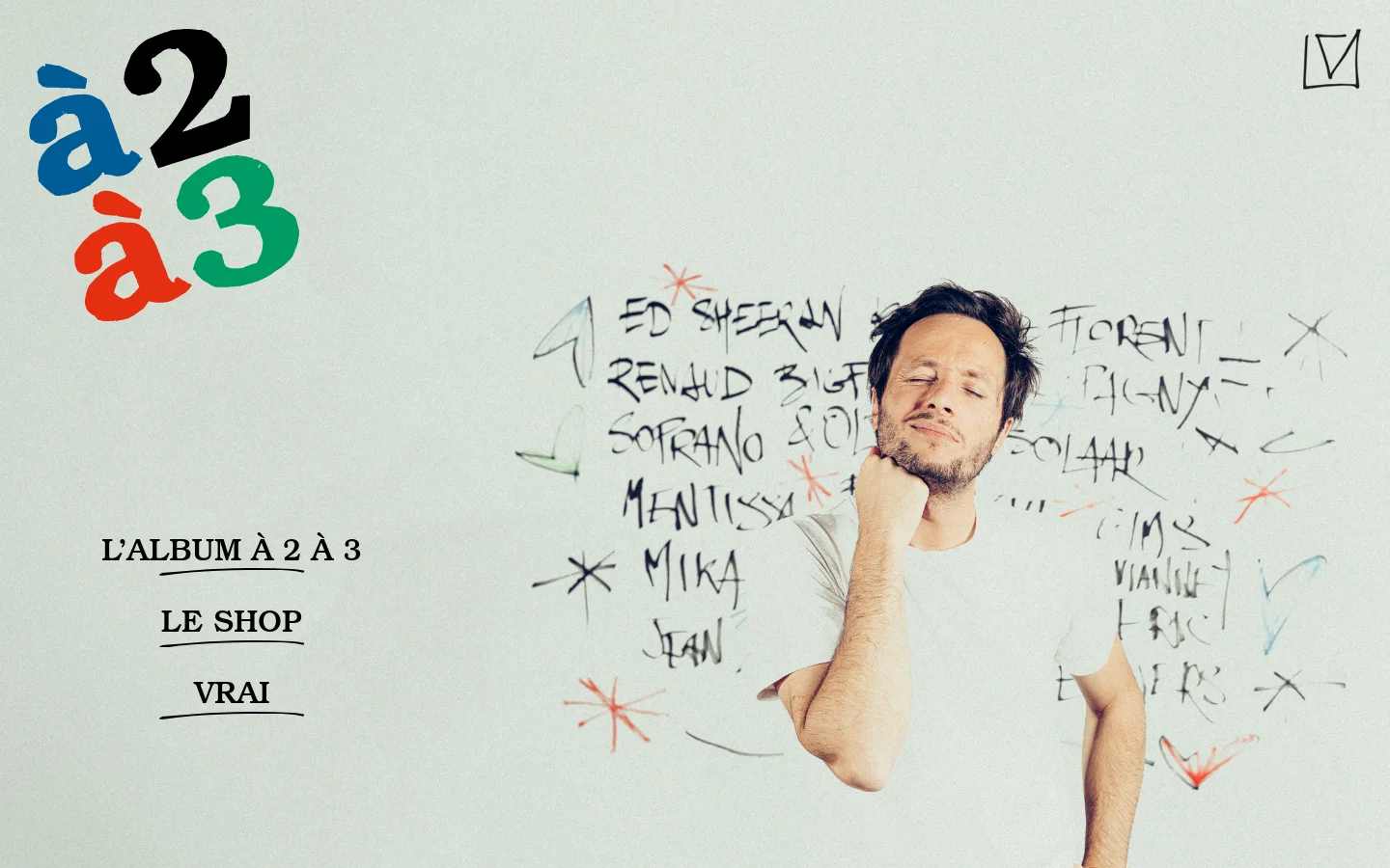 The desktop homepage features a minimalist light gray background with a large hero image of musician Vianney on the right, standing next to a wall covered in handwritten artist names. On the left, large stylized text reads 'à 2 à 3' in blue, black, red, and green, above navigation links for 'L'ALBUM À 2 À 3', 'LE SHOP', and 'VRAI'.
