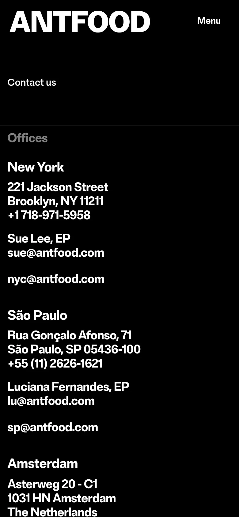 The mobile version presents a simplified, single-column vertical layout on a black background. The content focuses on the 'Contact us' headline followed by the office locations and contact details stacked vertically for easy scrolling. The large side image from the desktop version is removed to prioritize text readability.