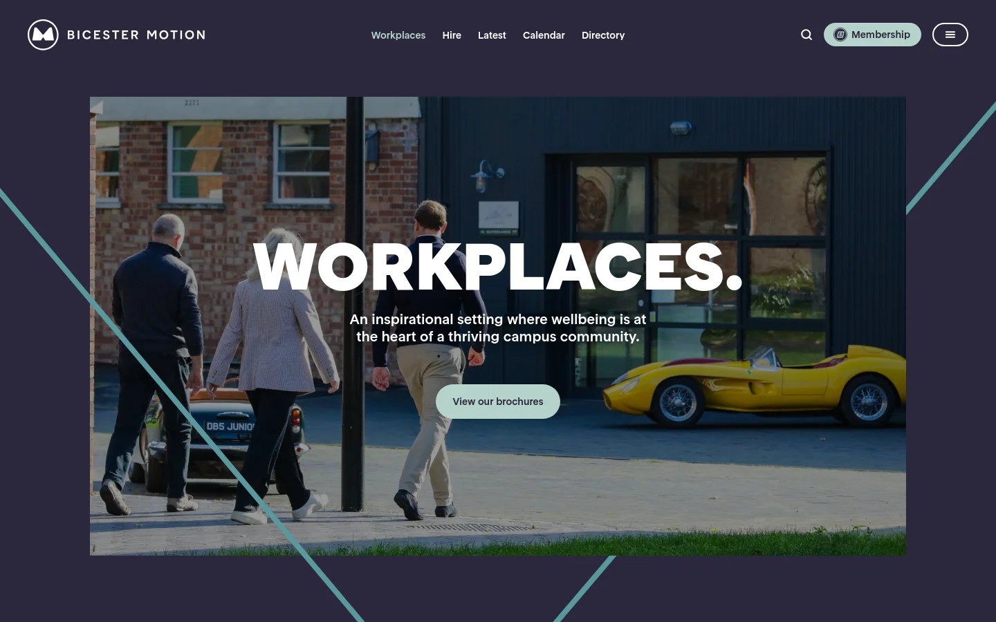 The desktop version features a dark navy background with a large hero image showing people walking past a vintage yellow sports car. The headline 'WORKPLACES.' is centered in bold white text above a subheadline and a light blue 'View our brochures' button. A navigation bar at the top includes links for Workplaces, Hire, Latest, Calendar, and Directory, alongside a search icon and membership button.