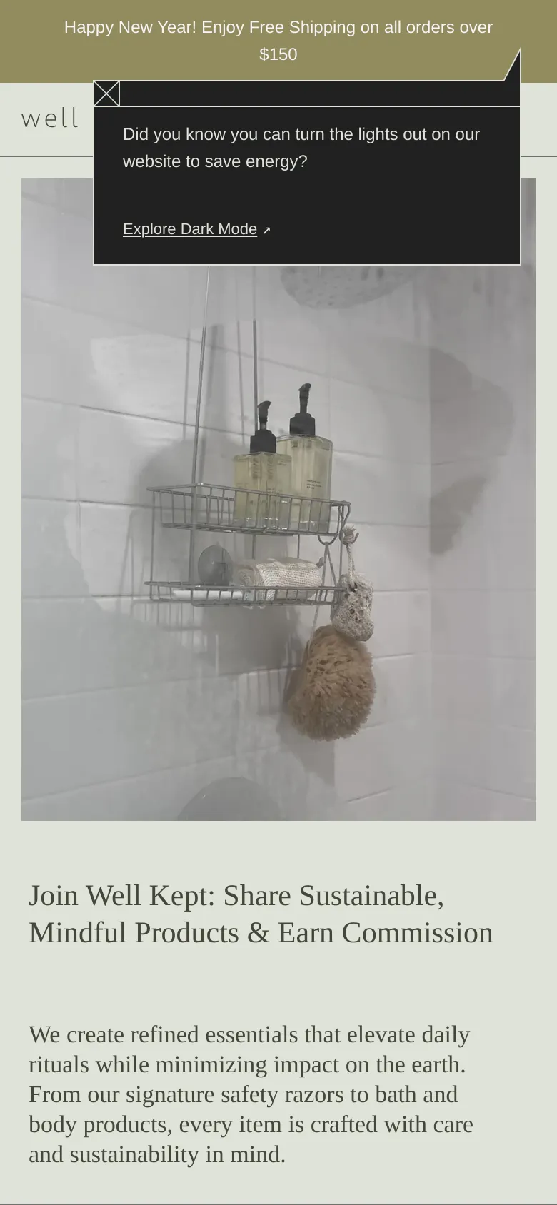 The mobile version presents a single-column vertical layout, placing the large lifestyle image of bathroom products above the main headline and text. The cream-colored background remains consistent, but the split-screen design is replaced by a stacked arrangement for easier scrolling. The dark mode energy-saving pop-up appears as an overlay at the top of the screen.
