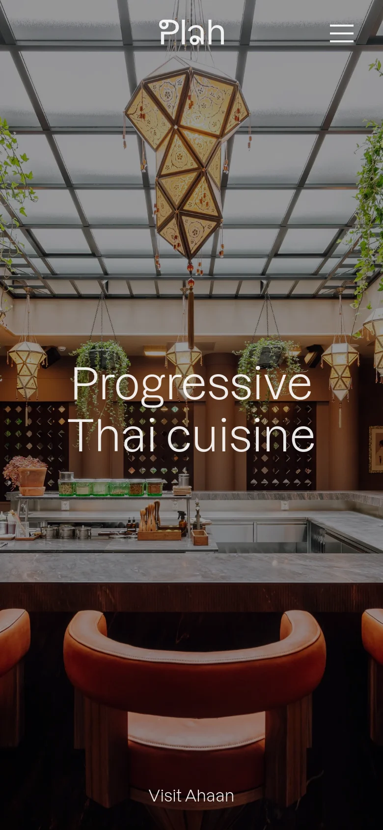 The mobile version uses the same restaurant interior background but optimizes the layout for a vertical screen, centering the 'Plah' logo and 'Progressive Thai cuisine' headline. The navigation links are replaced by a hamburger menu icon in the top right, and the 'Visit Ahaan' button is positioned at the bottom center.