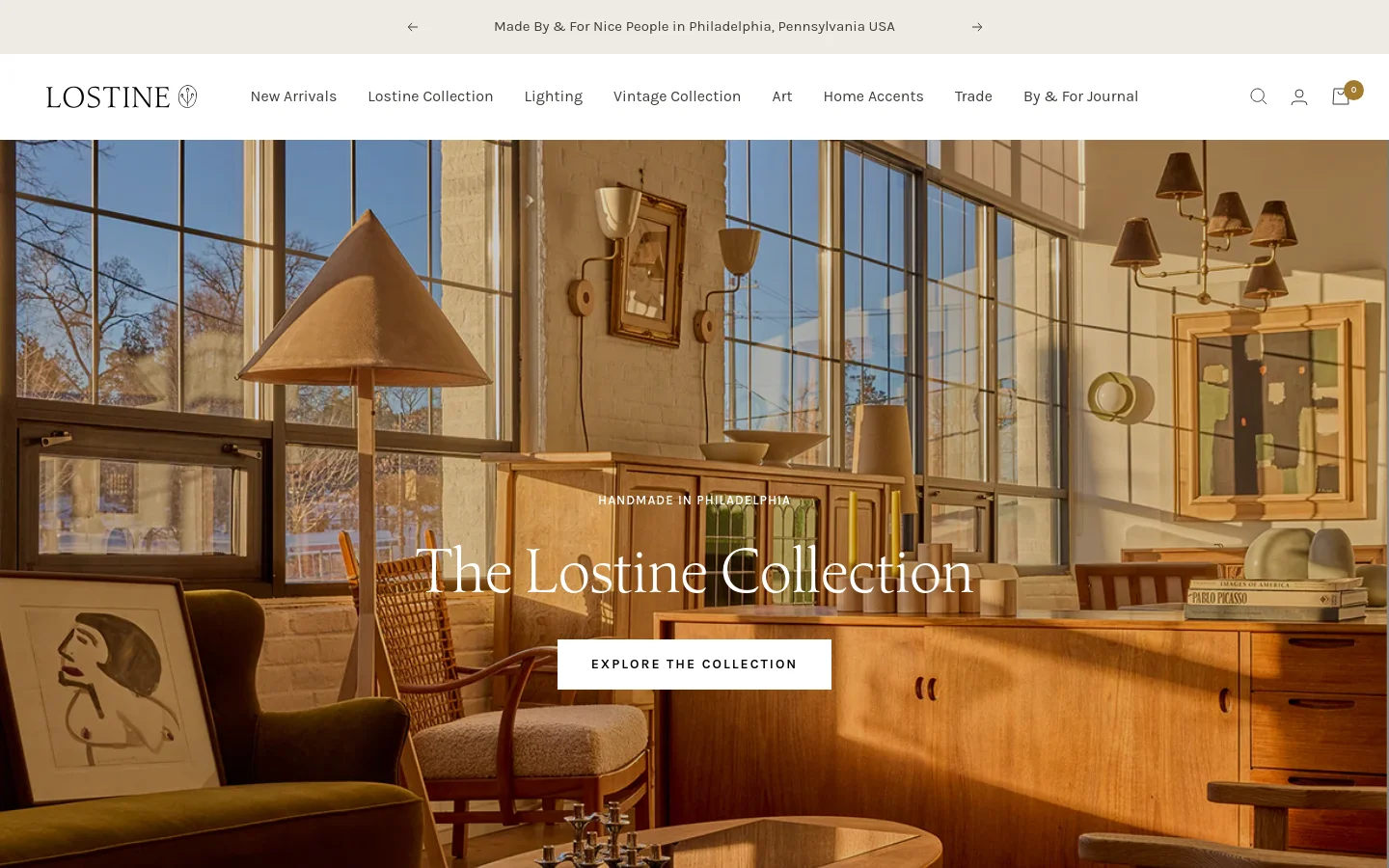 The desktop homepage features a minimalist white header with a navigation menu and a large hero image of a sunlit, mid-century modern living space. A centered overlay reads 'The Lostine Collection' with a call-to-action button 'EXPLORE THE COLLECTION'. Below the hero, a thin banner states that orders ship from Philadelphia.