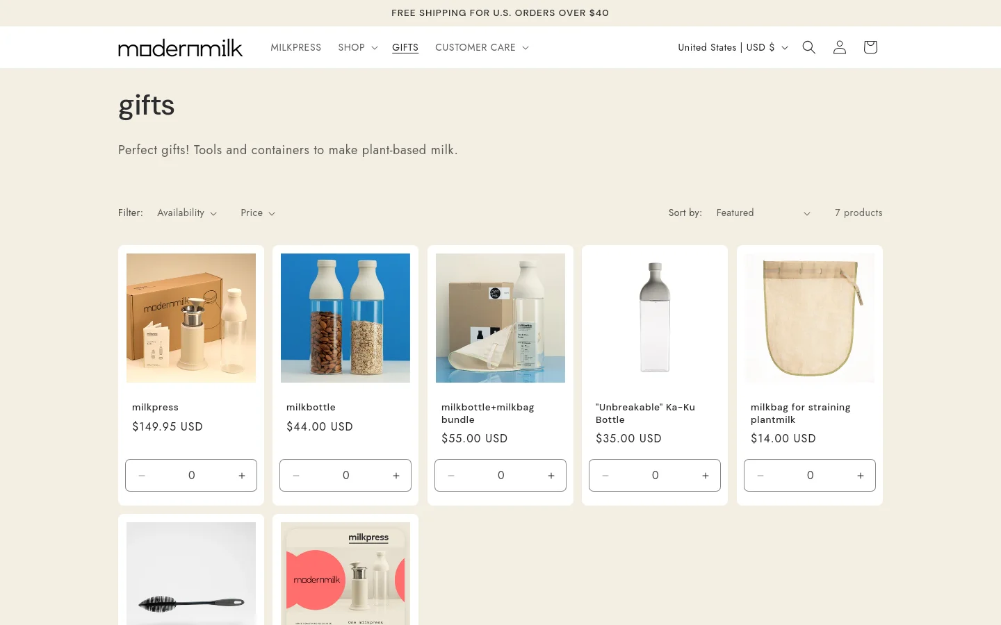 The desktop page features a minimalist design with a cream background and a header containing the ModernMilk logo and navigation links. A large 'gifts' heading is followed by a brief description, filter and sort options, and a grid of product cards showing items like the milkpress and milkbottle with their prices and quantity selectors. The layout is spacious with a clean, professional aesthetic.