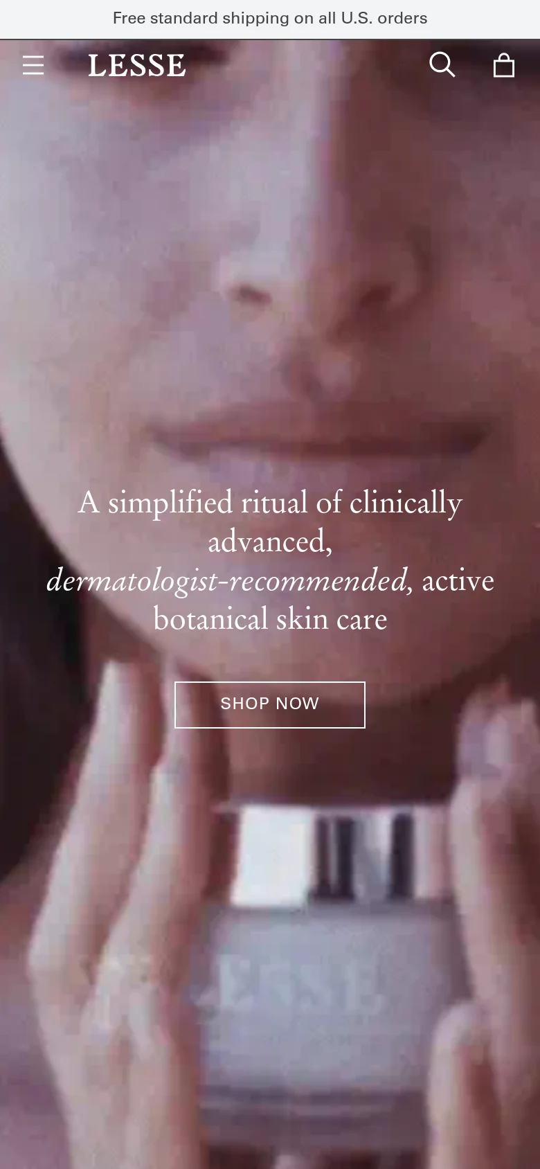 The mobile version presents a vertically stacked layout with a full-width hero image of a person's face and centered white text and a 'SHOP NOW' button. The navigation bar at the top is condensed, featuring a hamburger menu, the LESSE logo, a search icon, and a shopping bag icon. The overall aesthetic remains minimalist with high-contrast white text over a soft-focus photographic background.