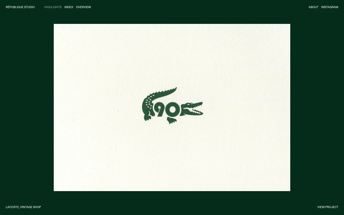 The desktop Highlights page features a dark green background with a minimalist navigation menu at the top. A large, centered white rectangular area displays a project image, which in this view shows a green Lacoste crocodile logo. Below the image, text identifies the project as 'CENTRE POMPIDOU, STUDIO 13/16' with a 'VIEW PROJECT' call to action.