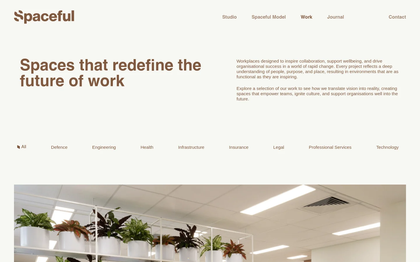 The desktop page features a minimalist design with a white background and dark grey text. A large headline reads 'Spaces that redefine the future of work' on the left, with a descriptive paragraph on the right. Below, a horizontal filter menu lists categories like Defence and Engineering, followed by a large project image showing an office interior with plants and the red 'Ricoh' logo.