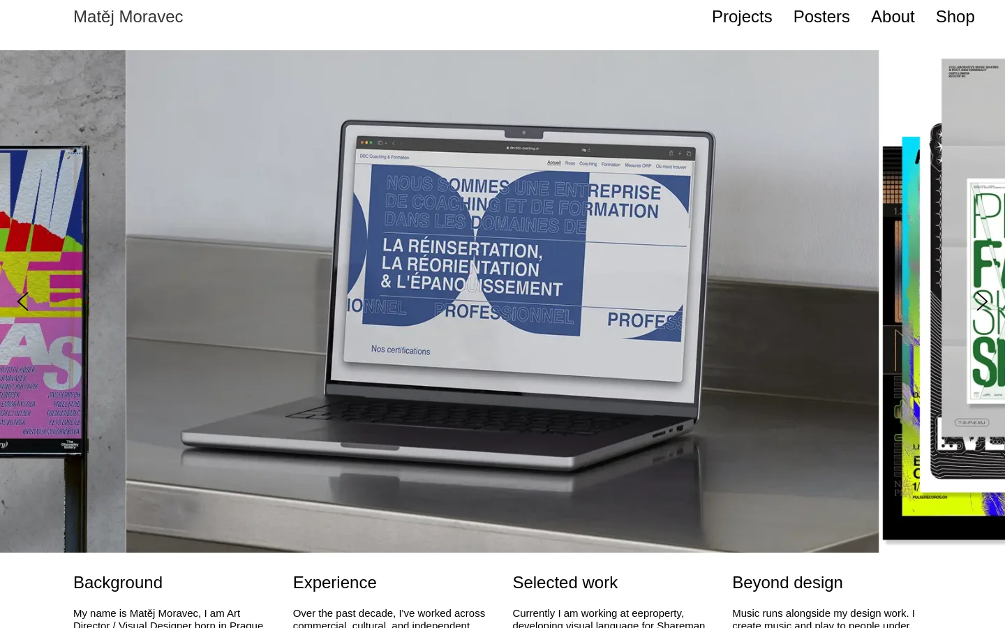 Desktop homepage for Matěj Moravec, an Art Director and Visual Designer. The layout features a minimalist white header with navigation links and a large hero section showcasing a carousel of design projects, including a laptop displaying motion graphics. Below the hero, the page transitions into a clean, text-based layout with sections for Background, Experience, Selected work, and Beyond design.