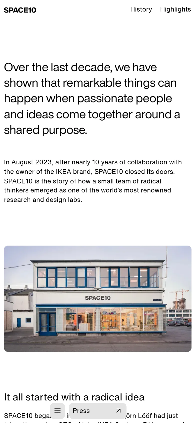 The mobile version maintains the clean white background and large black text but stacks the content vertically for a single-column view. The hero image of the building with blue windows spans the width of the screen, and the navigation is condensed into a top bar with a menu icon.