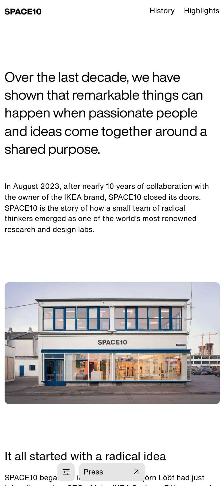 The mobile version maintains the clean white background and large black text but stacks the content vertically for a single-column view. The hero image of the building with blue windows spans the width of the screen, and the navigation is condensed into a top bar with a menu icon.