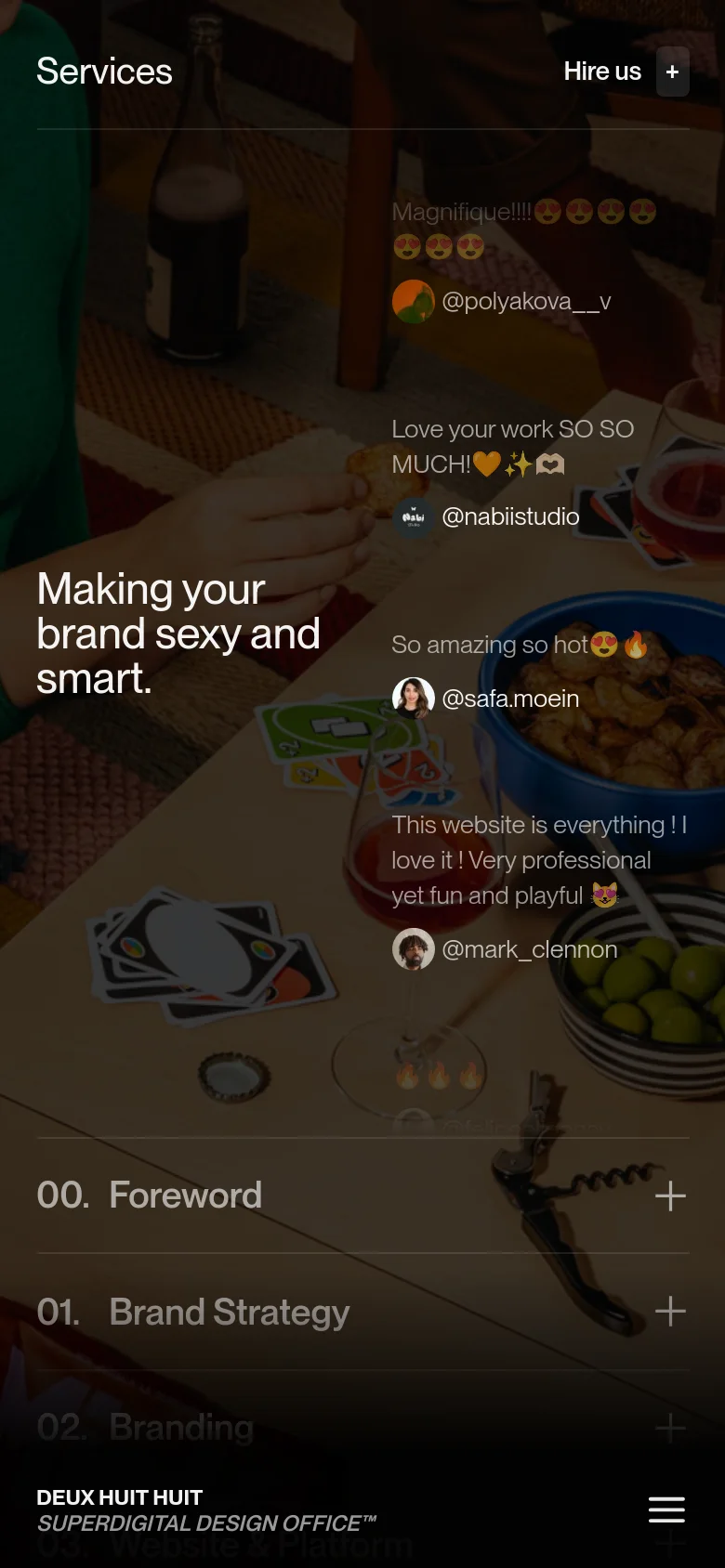 The mobile version uses a full-screen background image of a lifestyle scene with warm lighting and social media comments floating across it. The headline 'Making your brand sexy and smart' is prominently displayed in white text. A bottom navigation bar and a hamburger menu are present, and the service list is presented as expandable accordion items with plus icons.
