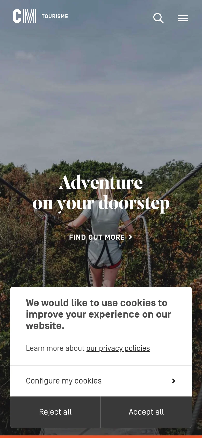 The mobile version displays the same hero image and headline, but the navigation is condensed into a hamburger menu and a search icon at the top. A prominent cookie consent overlay covers the bottom half of the screen with options to 'Reject all', 'Accept all', or 'Configure my cookies'.