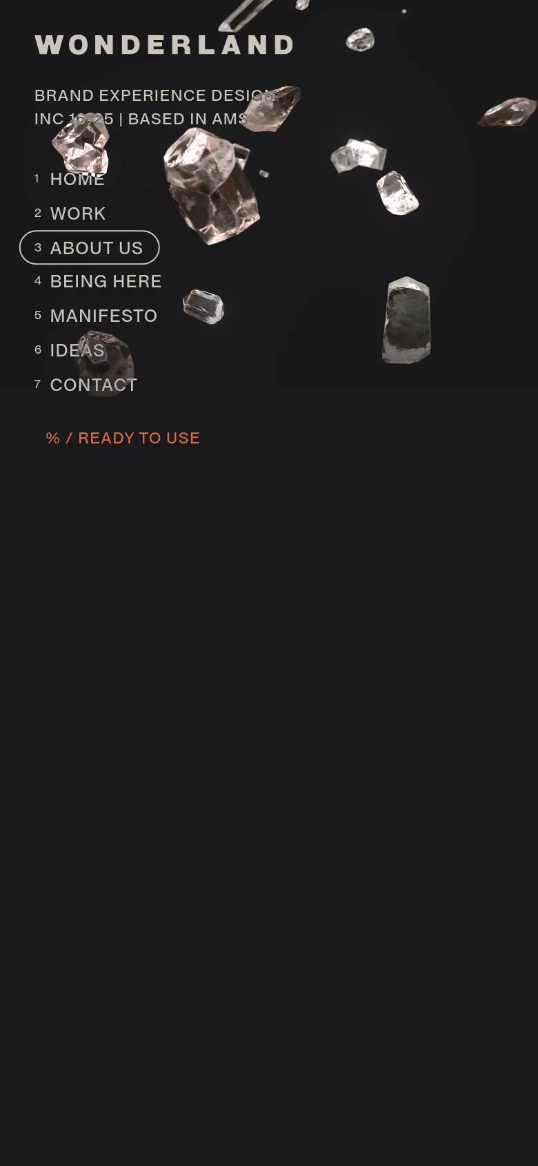 The mobile version presents a similar dark aesthetic with floating crystal imagery, but the layout is more vertically compressed. The navigation menu and branding are scaled to fit the narrower screen, maintaining the white text on a black background and the pill-shaped highlight on the 'ABOUT US' menu item.