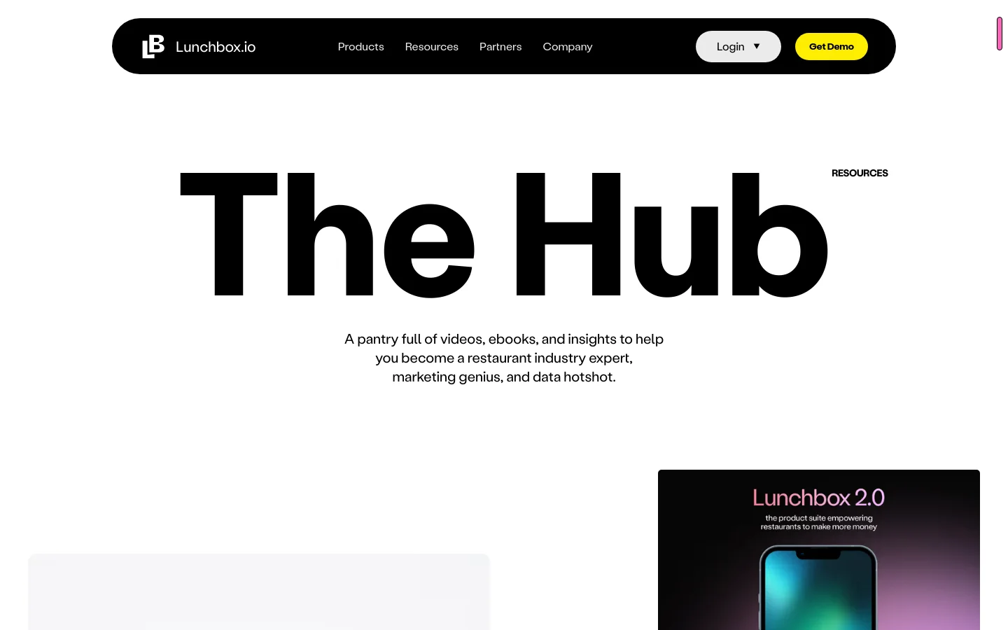 The desktop page features a clean, minimalist white background with a black navigation bar at the top containing the Lunchbox logo, menu links, and 'Get Demo' button. A large, bold headline reads 'The Hub' under a small 'RESOURCES' label, followed by a descriptive subheadline about industry insights. Below the text, a large image displays an open ebook titled 'Market Growth Trends' with colorful data charts.