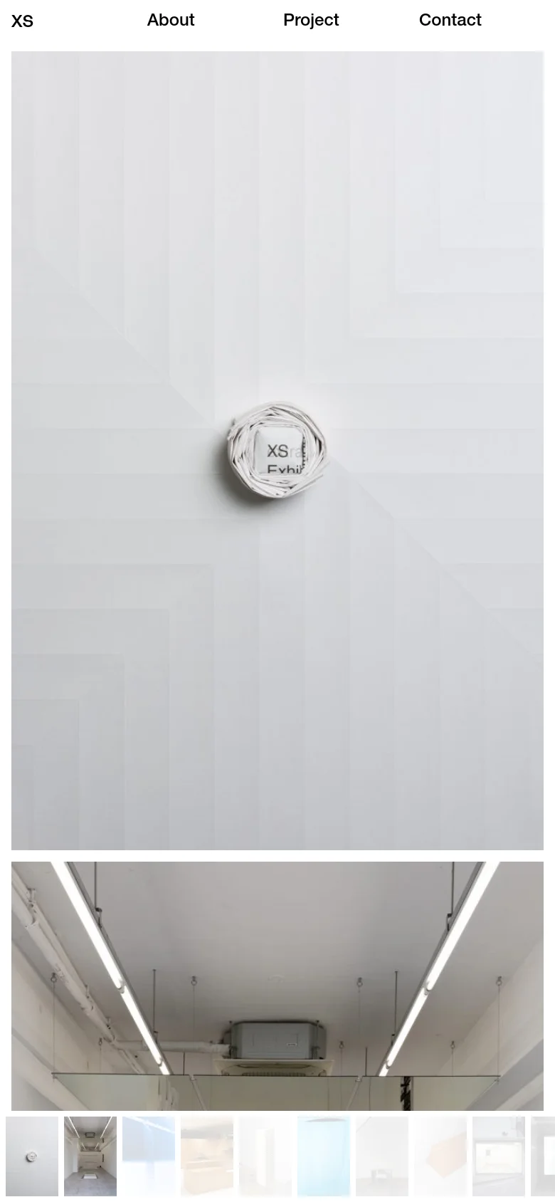 The mobile version maintains the minimalist white aesthetic but uses a single-column vertical layout. The large hero images are stacked vertically, and the navigation links are positioned at the top, providing a streamlined scrolling experience for viewing the studio's visual portfolio.