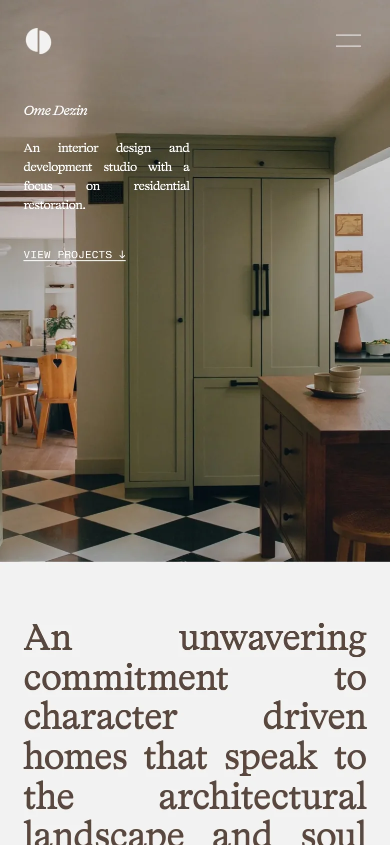 The mobile version maintains the minimalist design but stacks elements vertically for readability. The hero image is cropped to focus on the kitchen interior, and the navigation menu is condensed into a hamburger icon at the top right.