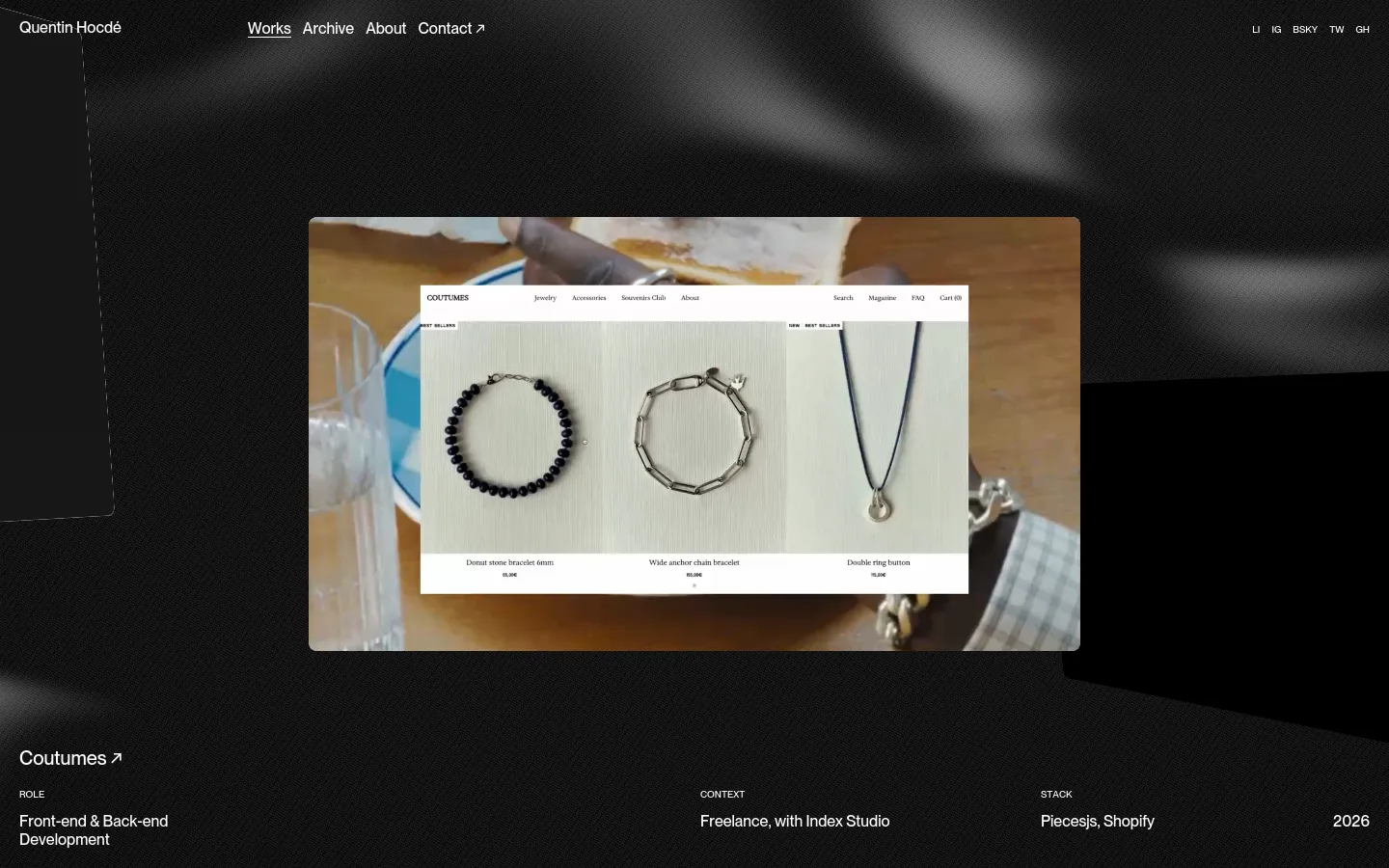 Quentin Hocdé works page featuring a dark, cinematic portfolio layout with a large blurred background. A central project card displays the Coutumes e-commerce site with jewelry imagery, followed by project details including role, context, and tech stack like Shopify.