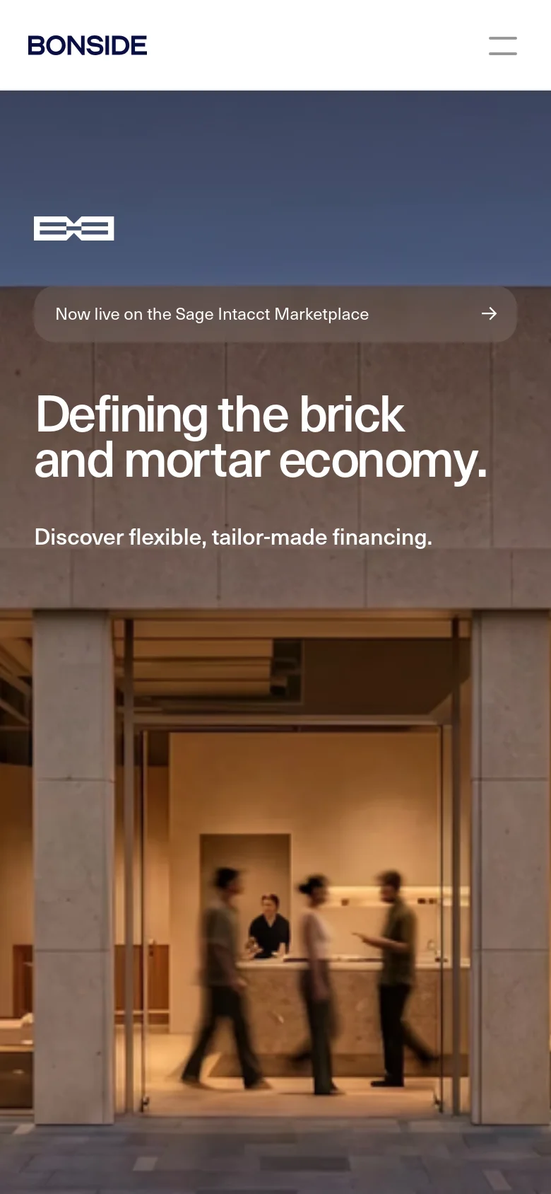 The mobile version presents a vertically stacked layout with the hero image of the storefront filling the background. The headline and subheadline are centered, and the top navigation is replaced by a hamburger menu icon on the right.
