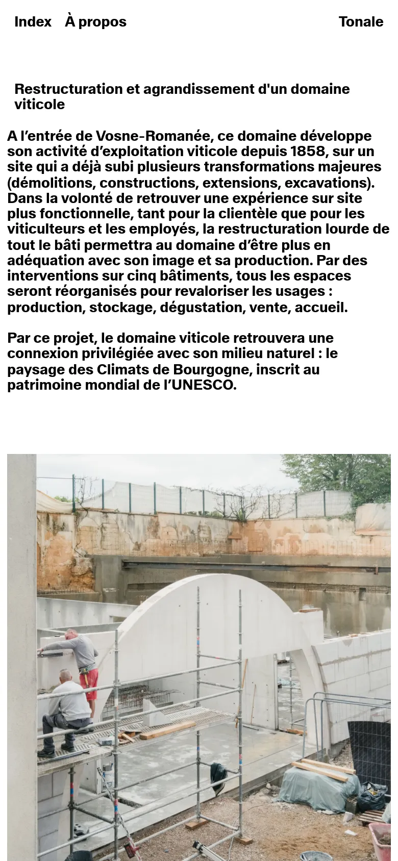 Mobile version of the project page where the layout shifts to a single vertical column. The large construction image is positioned at the top, followed by the project title, descriptive text, and technical specifications list. The navigation menu is condensed at the top of the screen.