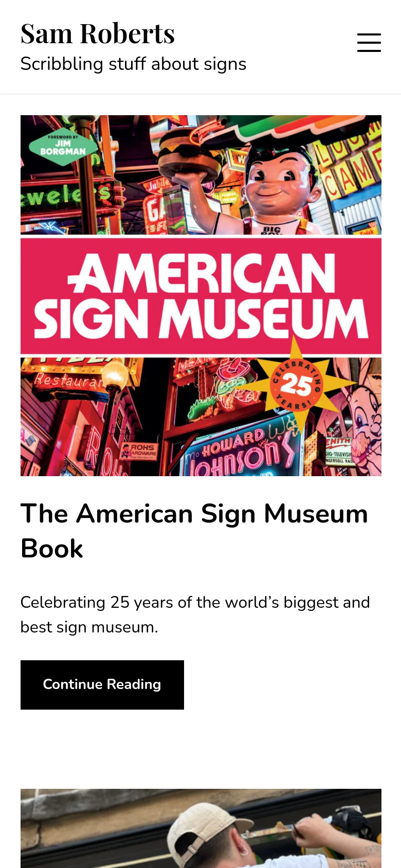 The mobile version displays a single-column layout with the site title and a hamburger menu icon at the top. Content is stacked vertically, starting with a large full-width hero image for 'The American Sign Museum Book' followed by its headline, description, and a prominent black button.