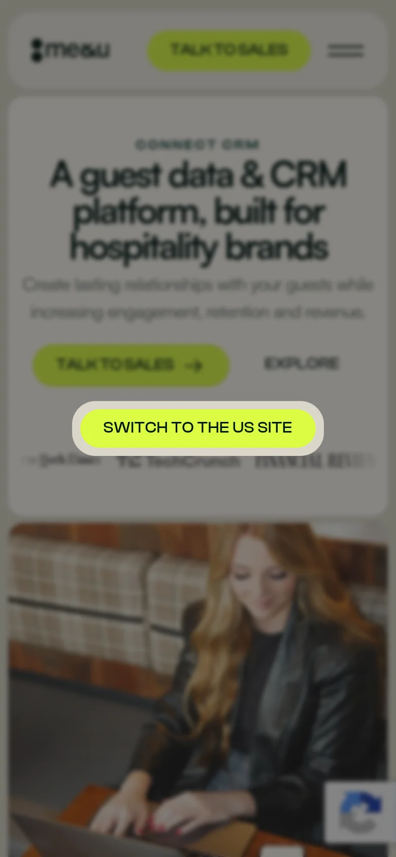 The mobile version presents a vertically stacked layout with the hero headline and 'TALK TO SALES' button centered above the main imagery. The location selection pop-up is prominently centered on the screen, obscuring much of the content. The navigation is condensed into a hamburger menu at the top right.