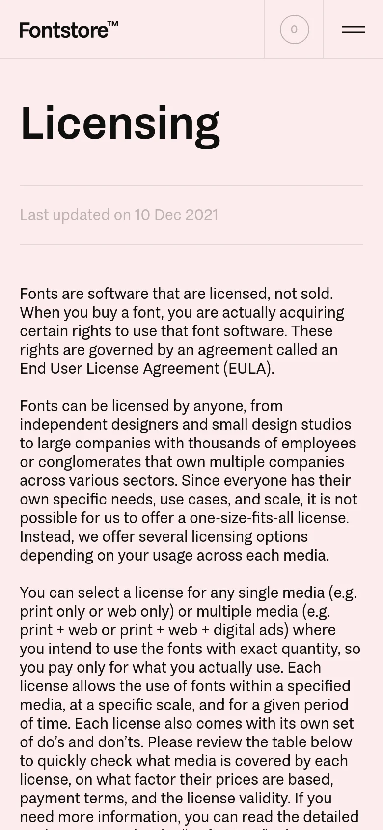 The mobile version presents a single-column layout optimized for vertical scrolling. The large 'Licensing' headline is centered above a 'Last updated' timestamp, followed by the explanatory text stacked vertically. The top navigation is simplified, featuring a hamburger menu icon and a circular cart icon.