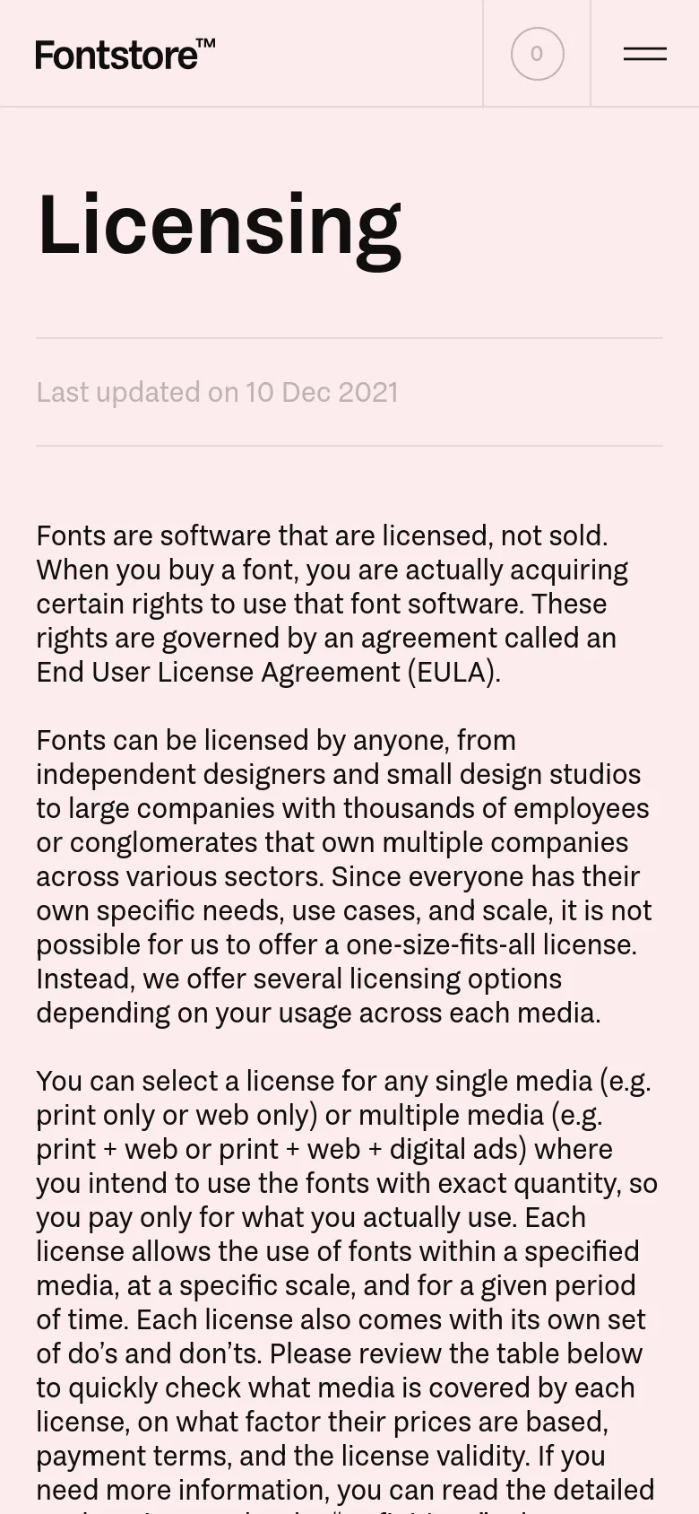 The mobile version presents a single-column layout optimized for vertical scrolling. The large 'Licensing' headline is centered above a 'Last updated' timestamp, followed by the explanatory text stacked vertically. The top navigation is simplified, featuring a hamburger menu icon and a circular cart icon.