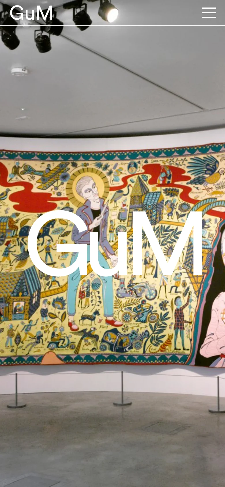 The mobile version maintains the large hero image of the illustrated mural with 'GuM' text, but the top navigation is condensed into a hamburger menu icon on the right. The layout is vertically stacked, presenting the company description and featured project images in a single-column format for easier scrolling.