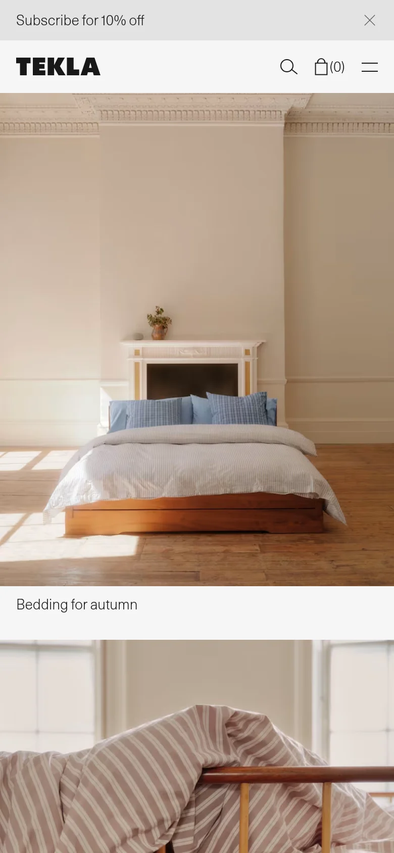 The mobile version uses a single-column layout with a condensed header featuring a hamburger menu, search icon, and shopping bag. The hero images are stacked vertically rather than side-by-side, focusing on large-scale lifestyle photography of the bedding products. The color palette remains neutral with soft beige, white, and light blue tones.