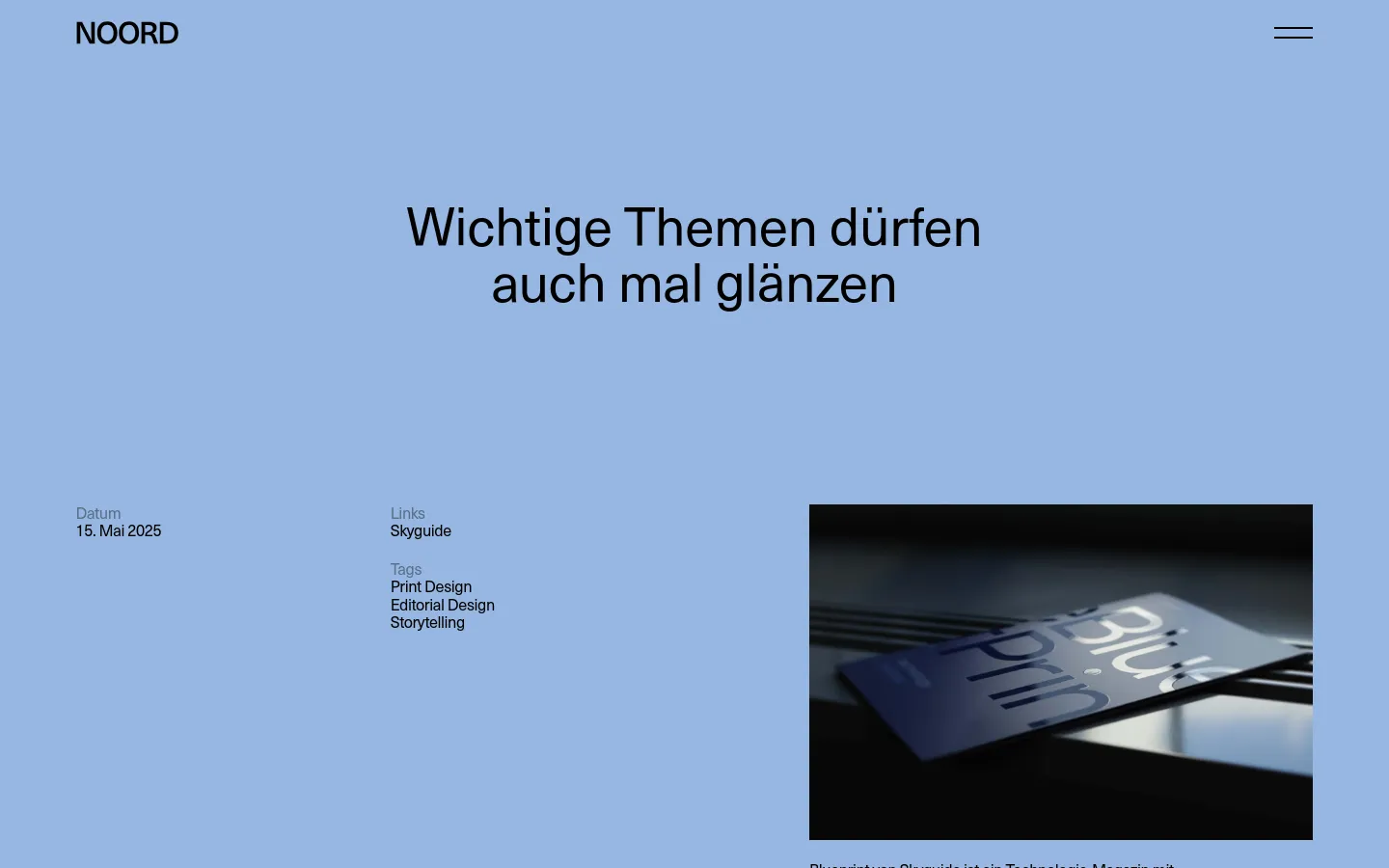 A desktop webpage with a light blue background featuring the headline 'Wichtige Themen dürfen auch mal glänzen' in large black text. Below the headline, the layout is split between metadata on the left—including date, links, and tags—and a large, high-quality photograph on the right showing a close-up of a printed magazine cover with reflective details.