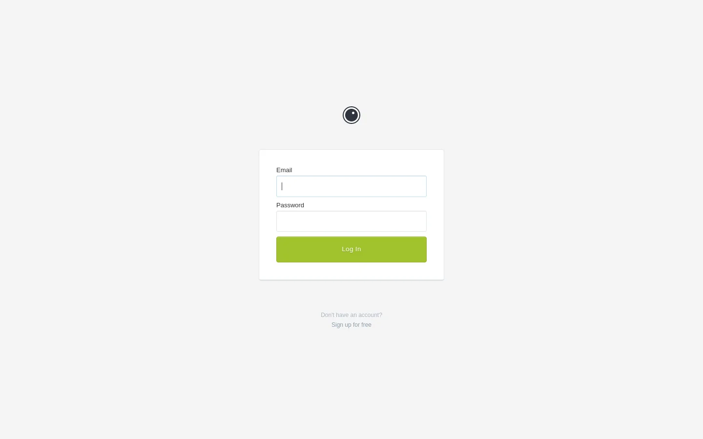 The desktop login page features a centered white login card on a light gray background. It contains a small circular logo at the top, input fields for Email and Password, and a prominent lime green 'Log In' button. Below the card, there is a text link that says 'Sign up for free'.