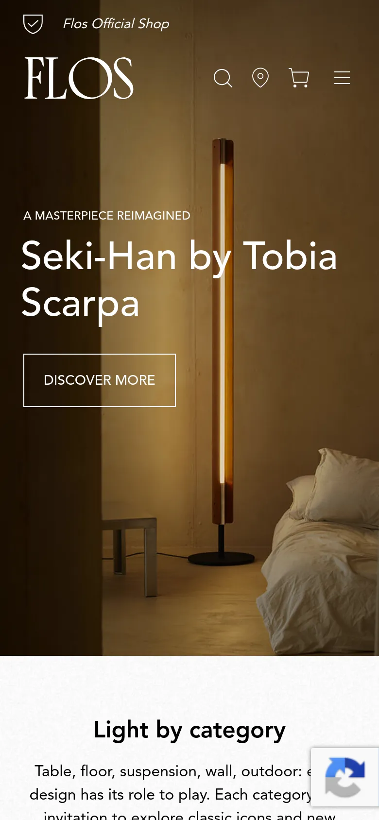 The mobile version presents a vertically stacked layout with the hero image of the Seki-Han lamp filling the top half of the screen. The headline and 'DISCOVER MORE' button are centered over the image, and the navigation menu is condensed into a hamburger icon alongside search, location, and cart icons.
