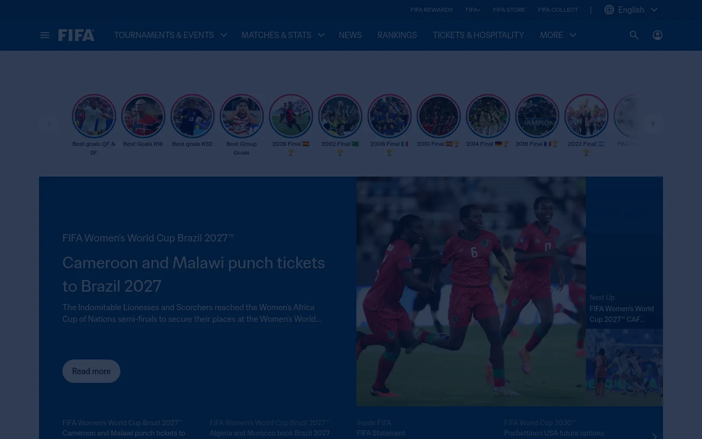 The FIFA homepage features a dark blue header with navigation links for tournaments, matches, news, and rankings. A horizontal carousel of circular thumbnail images showcases various football highlights, followed by a large hero section with a headline about Cameroon and Malawi qualifying for the 2027 Women's World Cup, accompanied by a large action photo of players and a 'Read more' button.