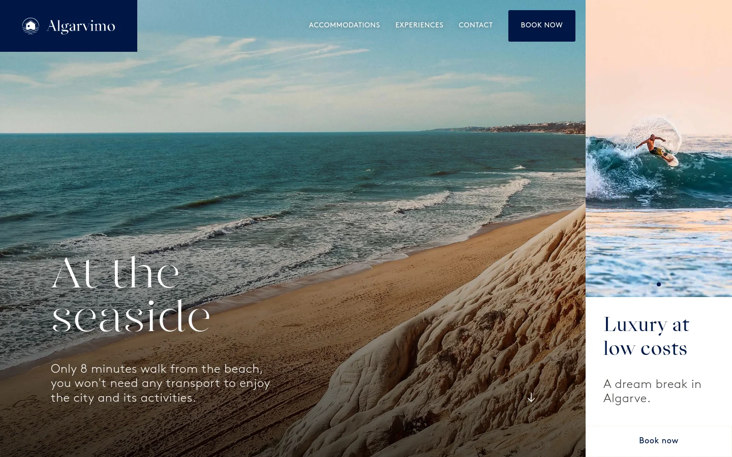 The desktop homepage features a large hero image of a sandy beach and ocean waves under a bright sky. A dark blue navigation bar at the top contains the Algarvimo logo, links for Accommodations, Experiences, and Contact, and a prominent 'Book Now' button. Large white text overlays the beach scene reading 'At the seaside' followed by a description of the location's proximity to the beach.