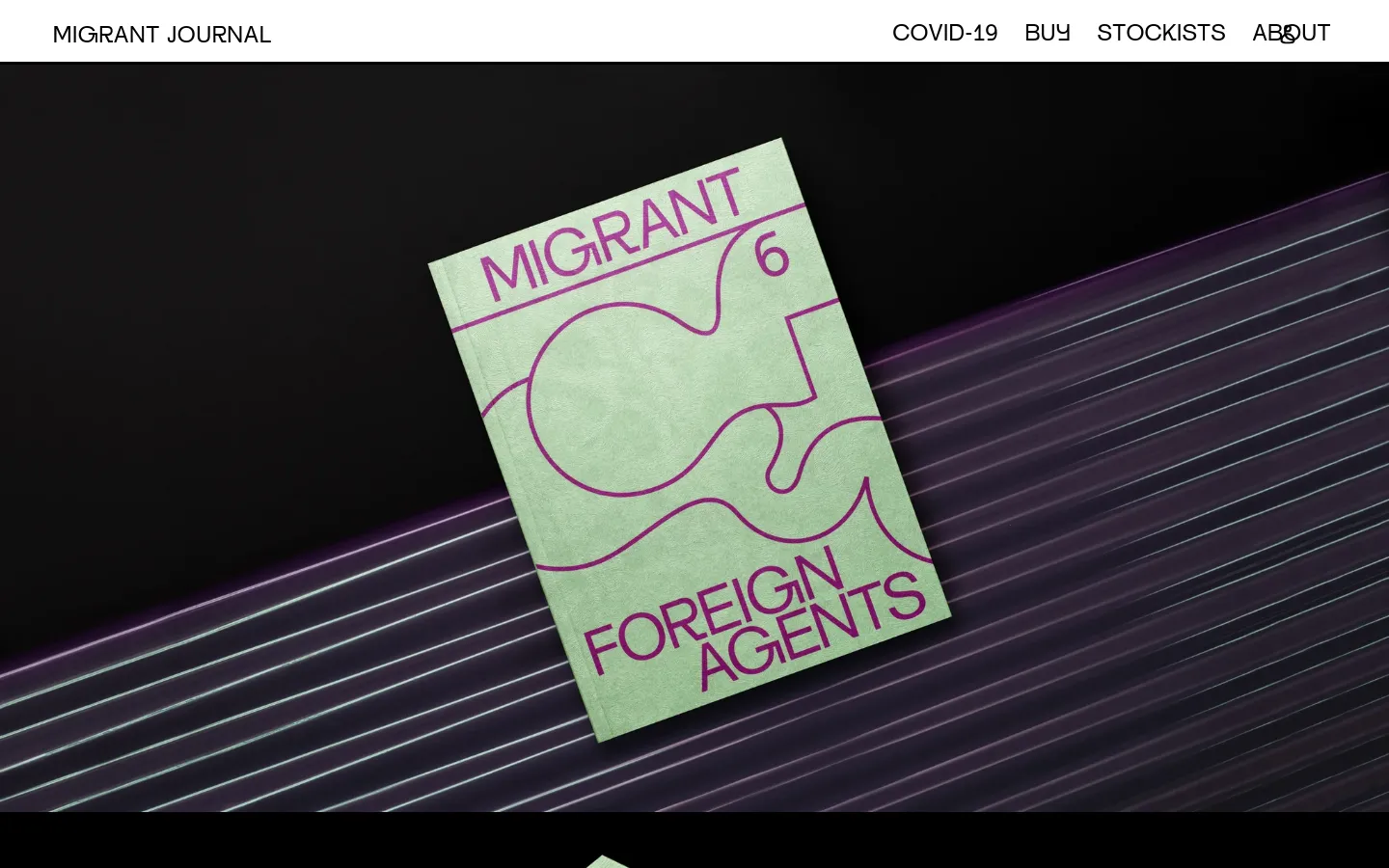 The desktop homepage features a minimalist black background with a large, tilted image of the 'Migrant Journal 6: Foreign Agents' publication cover in light green with purple text. A navigation menu at the top includes links for COVID-19, Buy, Stockists, and About. The layout is spacious and centered around the large hero image of the journal issue.